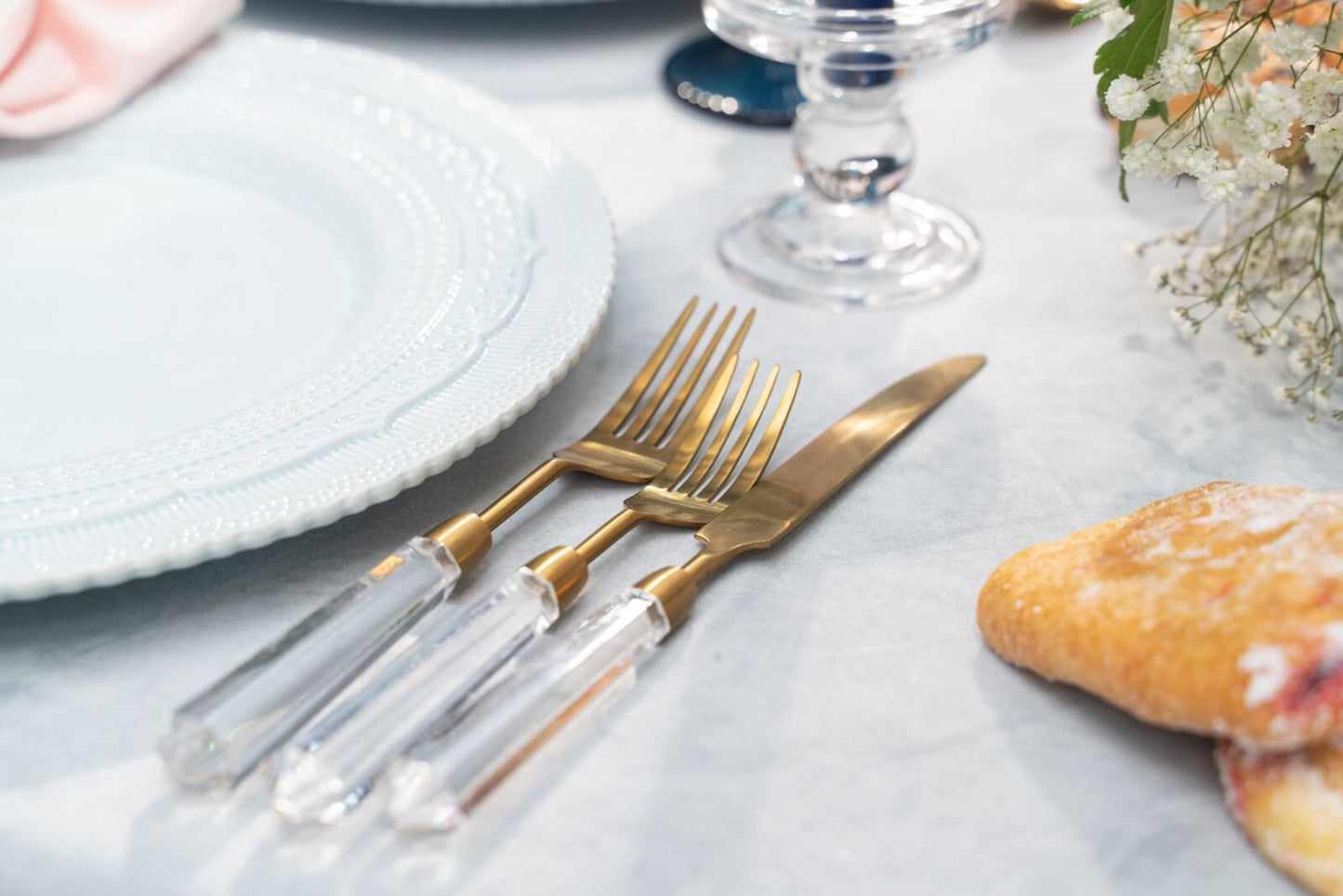 Gold Cutlery set with clear handle renting in Toronto