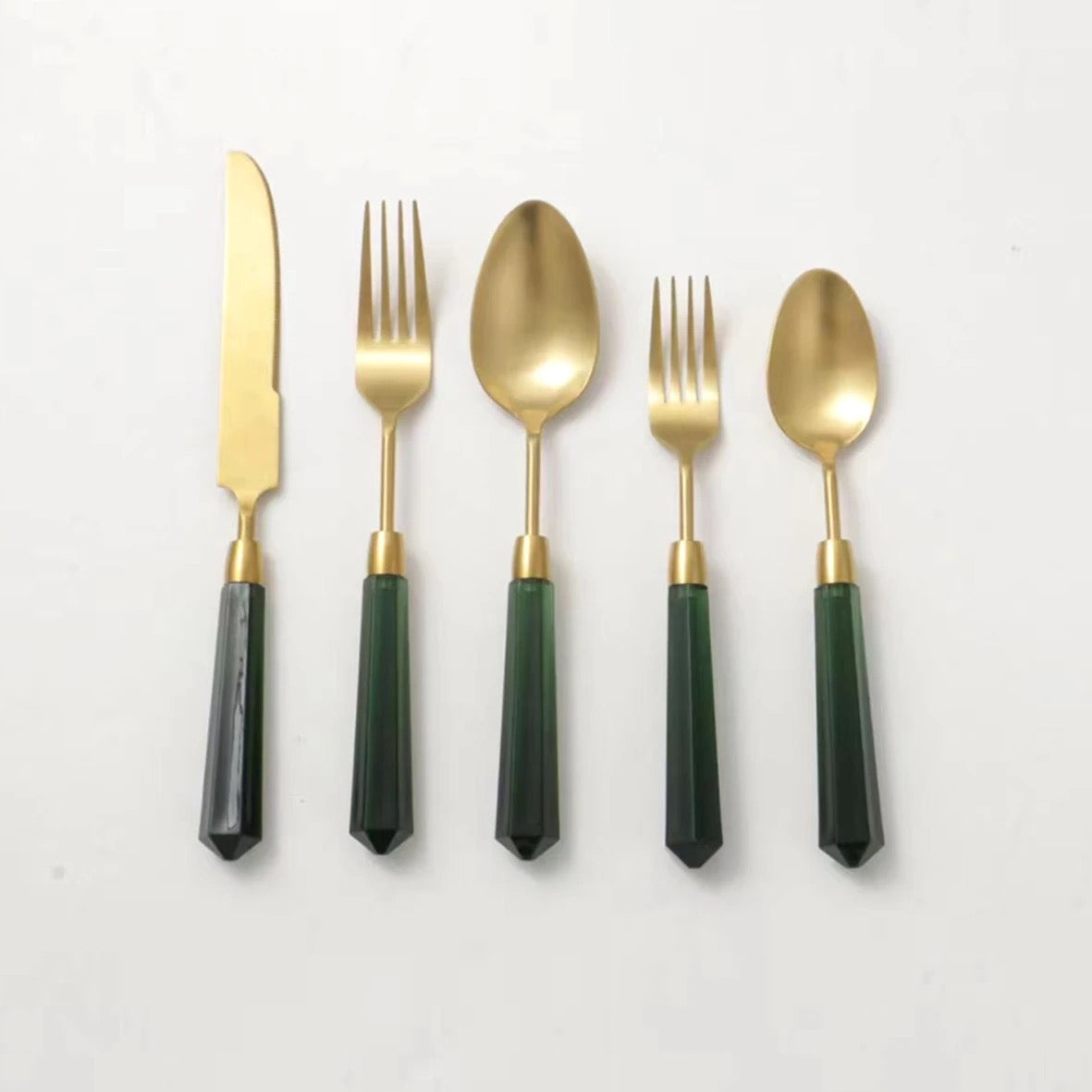 Emerald handle gold cutlery set rent for wedding